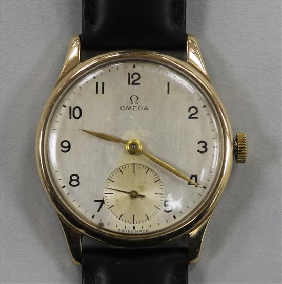 A 9ct gold Omega gents wrist watch, with Arabic numerals and seconds dial